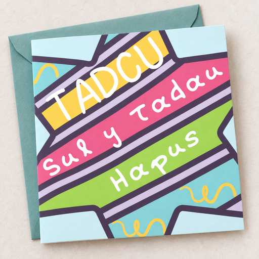 Cerdyn Sul y Tadau Tadcu – streipiau lliwgar / Welsh Father’s Day card for grandad with colourful stripes, lying flat beside a teal envelope.