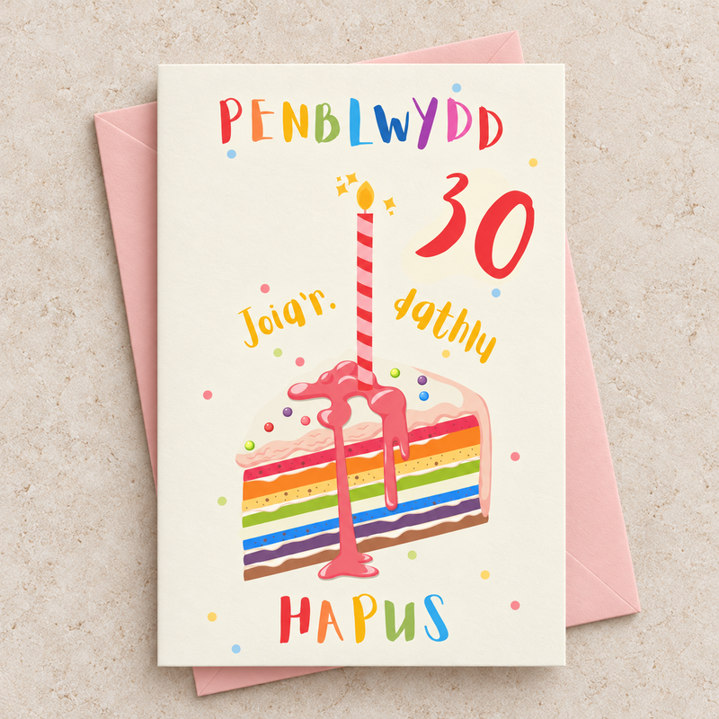 Cerdyn Penblwydd Hapus 30 gyda chacen enfys a channwyll, yn wastad gydag amlen binc / Welsh birthday card lying flat with a pink envelope